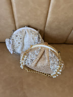 Close-up of the natural jute texture and precise pearl embroidery.