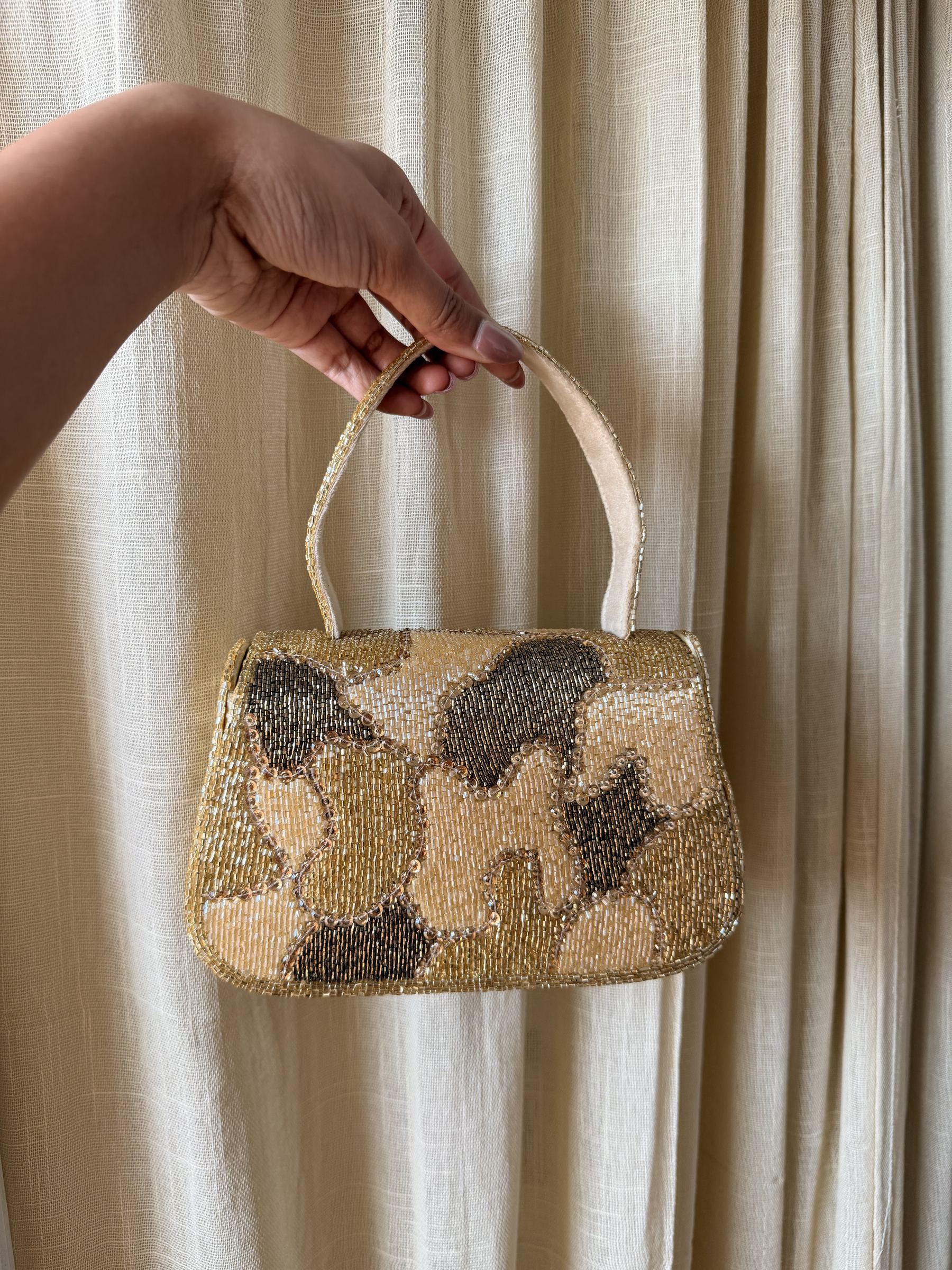 Rear panel view displaying the uniform hand-beaded pattern.