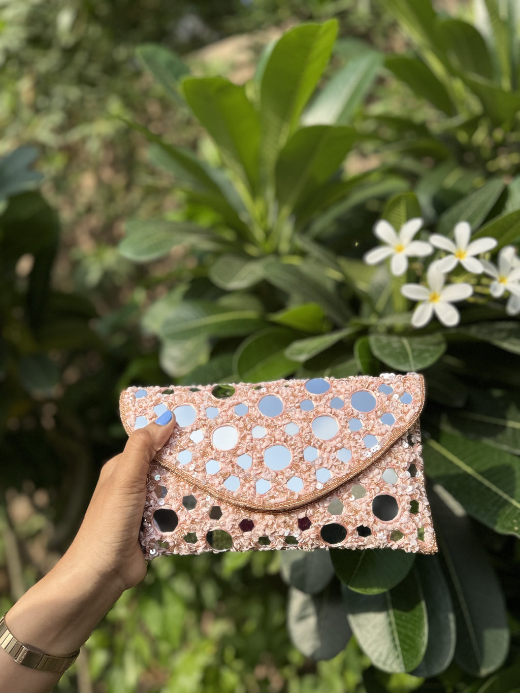 Front view of the Sheesha Flap bag, showing the geometric layout of the mirrors.
