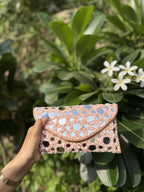 Front view of the Sheesha Flap bag, showing the geometric layout of the mirrors.