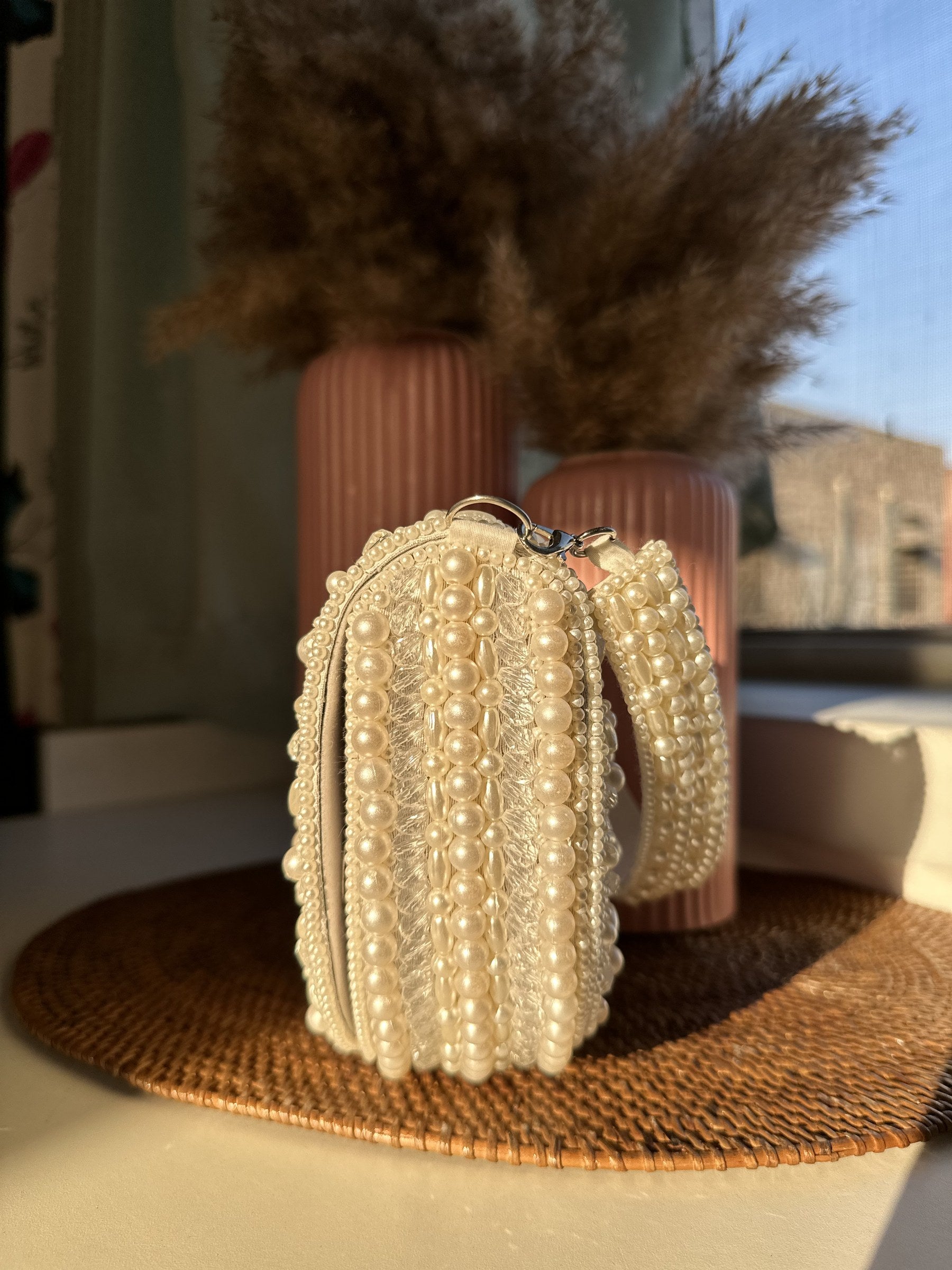 Front view of the Shukti White Statement Bag, showing its clean white rectangular silhouette.
