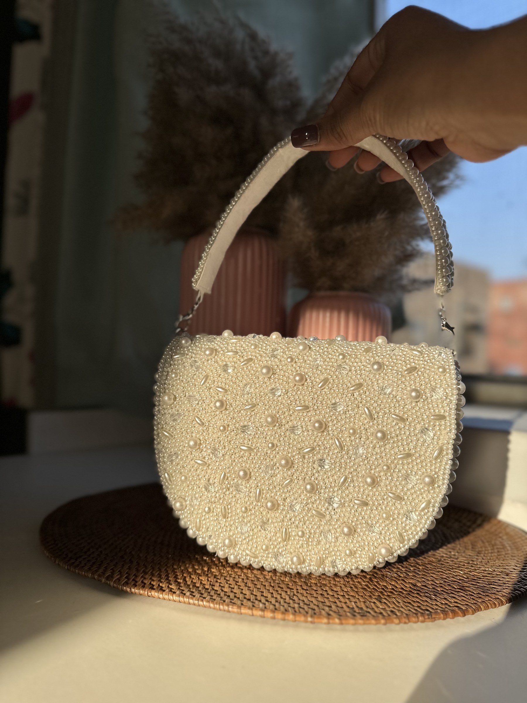 Top view of the Shukti bag highlighting the clasp closure frame.