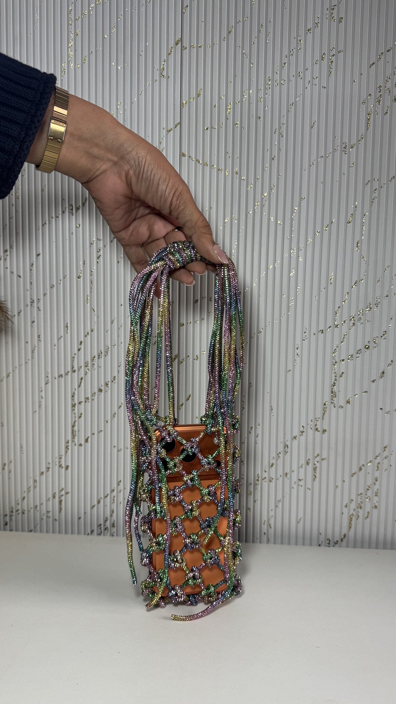 Front view of the Soul Glo Statement Bag displaying its multi-tone shimmering fabric.