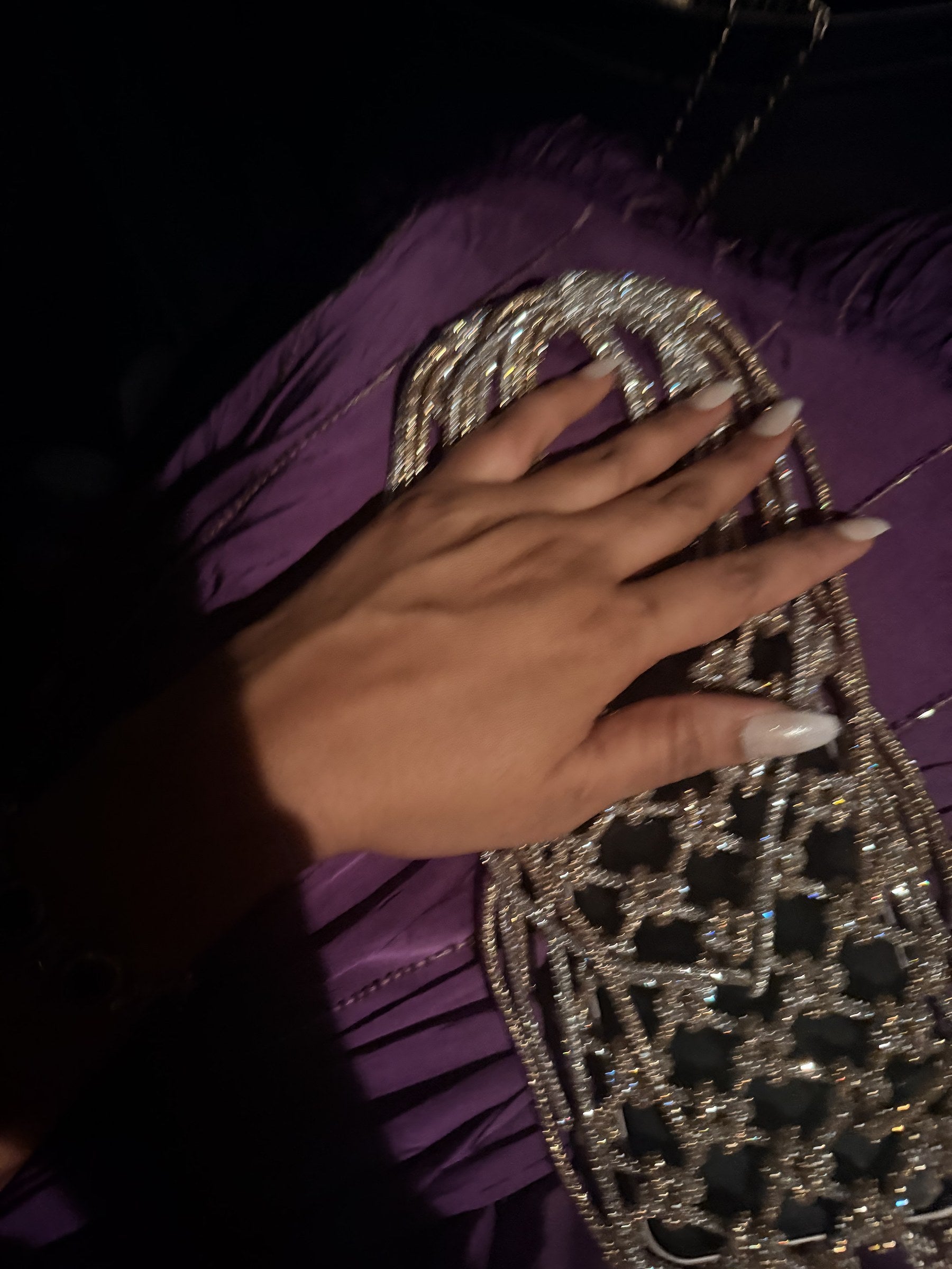 Side panel view of the Soul Glo bag showing its structured rectangular width.