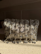 Front view of the Starlace bag, showing the details of the starlike lace pattern.