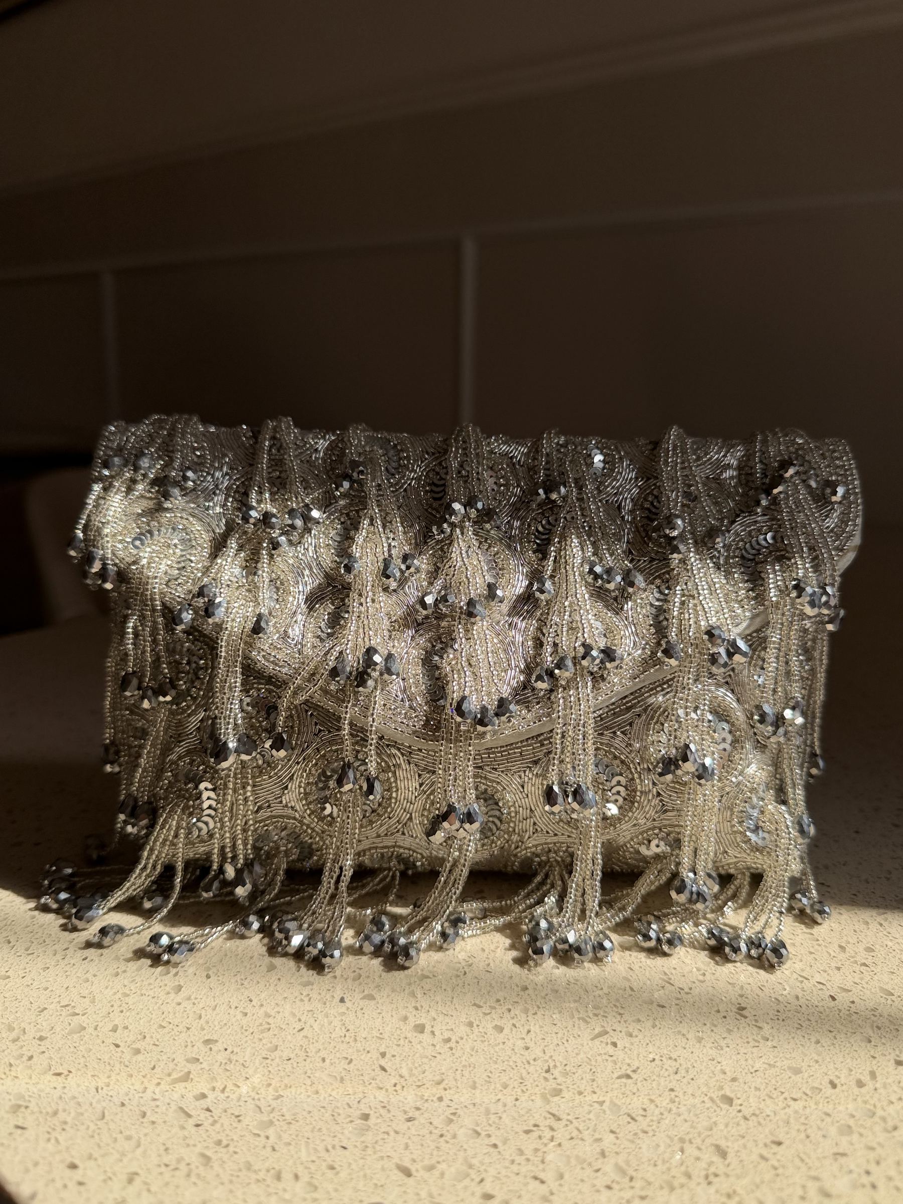 Front view of the Starlace bag, showing the details of the starlike lace pattern.