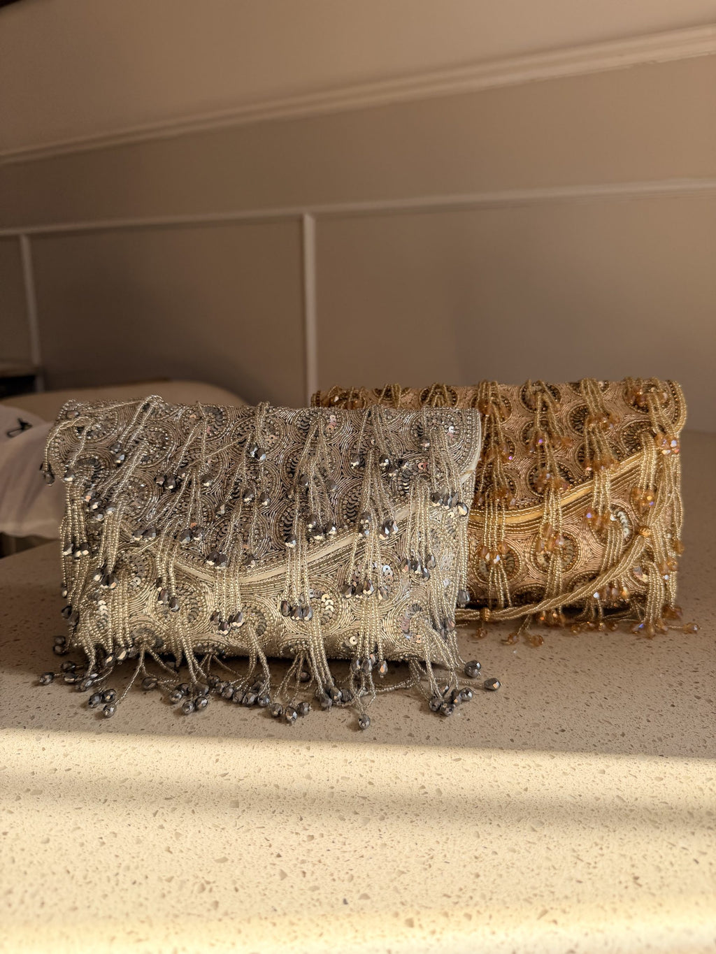 Open view of the Starlace handbag displaying its fabric lining, spacious pocket, and magnetic snap.