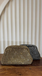 Top view of the Starlit bag showcasing the metal clasp lock frame.