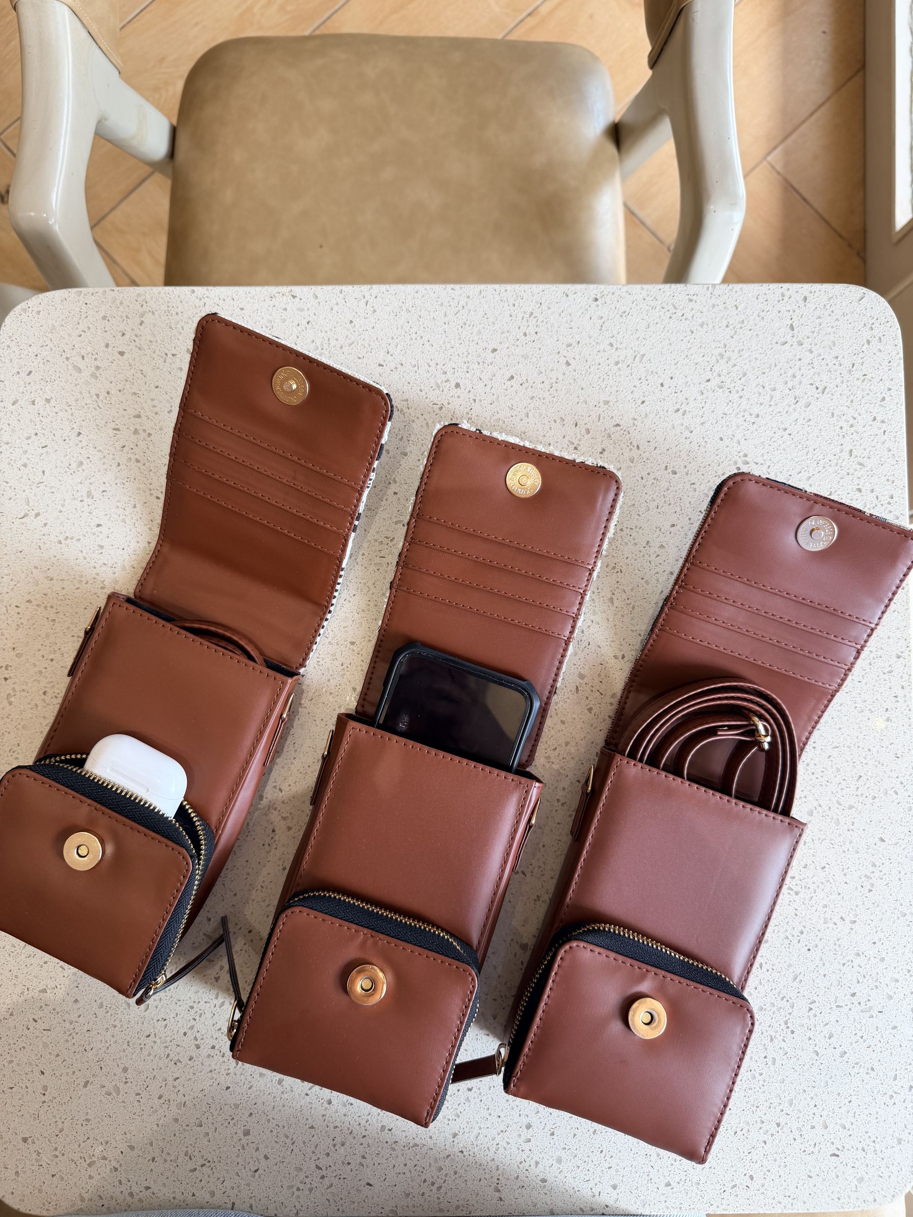 Back pocket view of the utility sling, illustrating secure space for boarding passes.