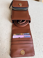 The utility sling standing vertically, highlighting its flexible fabric structure.