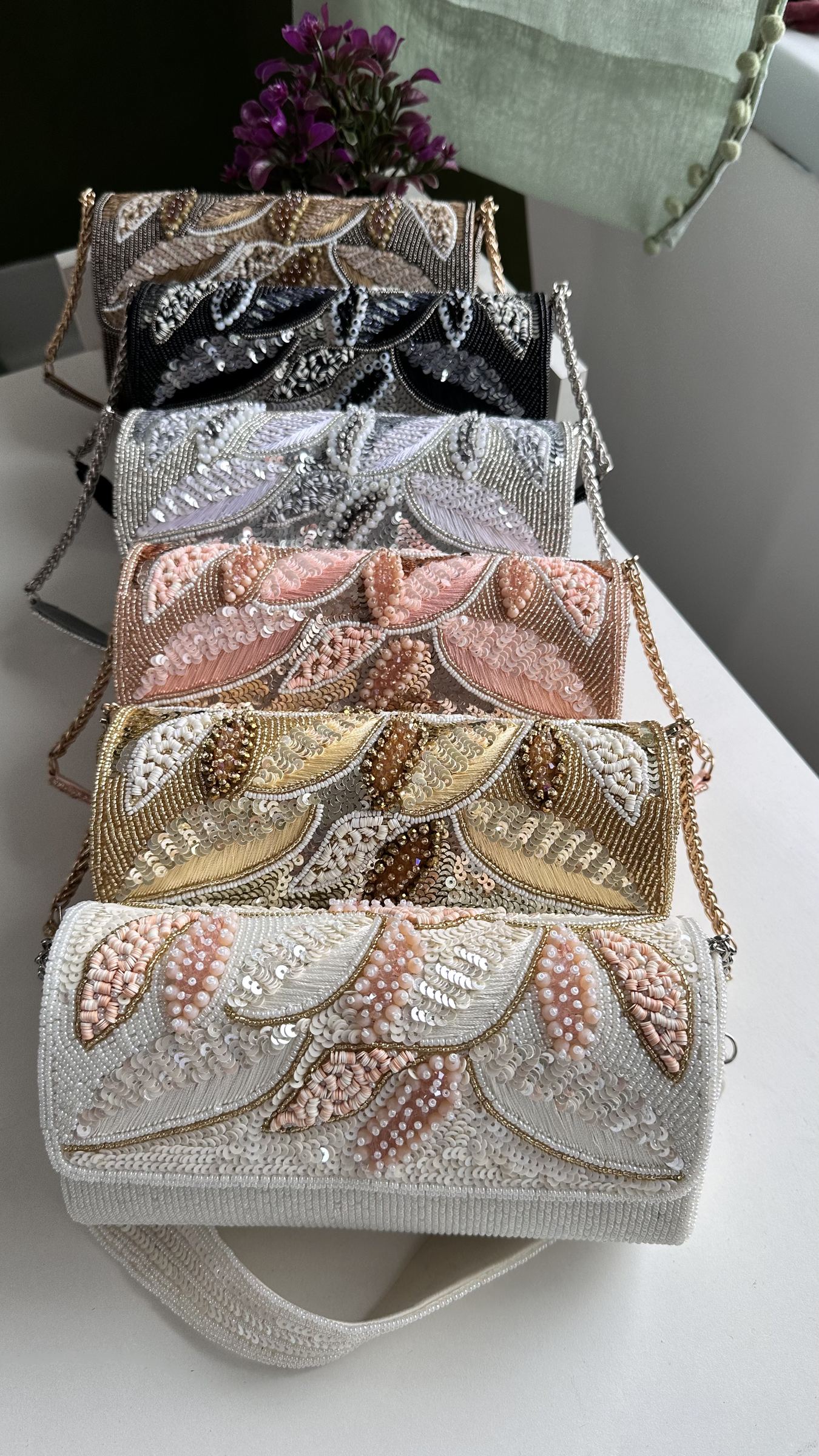 Side panel view of the Sunara bag showcasing its structured rectangular frame.