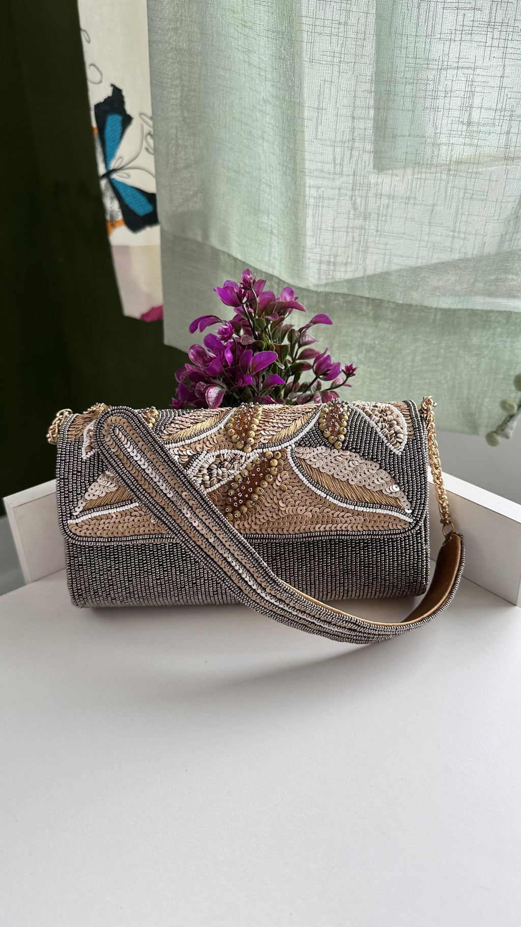Top view of the Sunara bag highlighting the gold-tone frame clasp.
