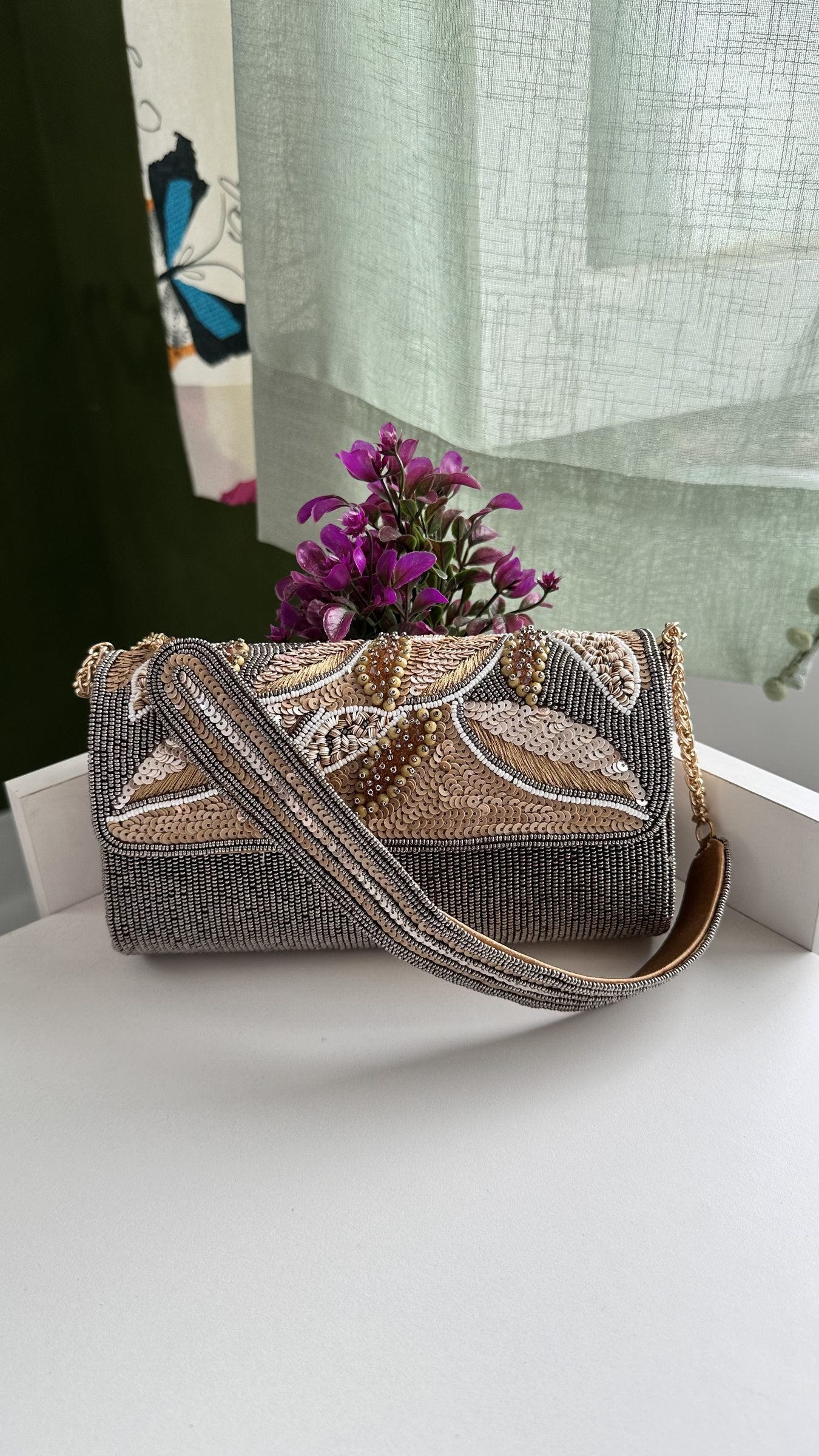 Top view of the Sunara bag highlighting the gold-tone frame clasp.