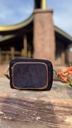 Detail shot of the ribbed corduroy fabric lines and the clean top zipper construction.