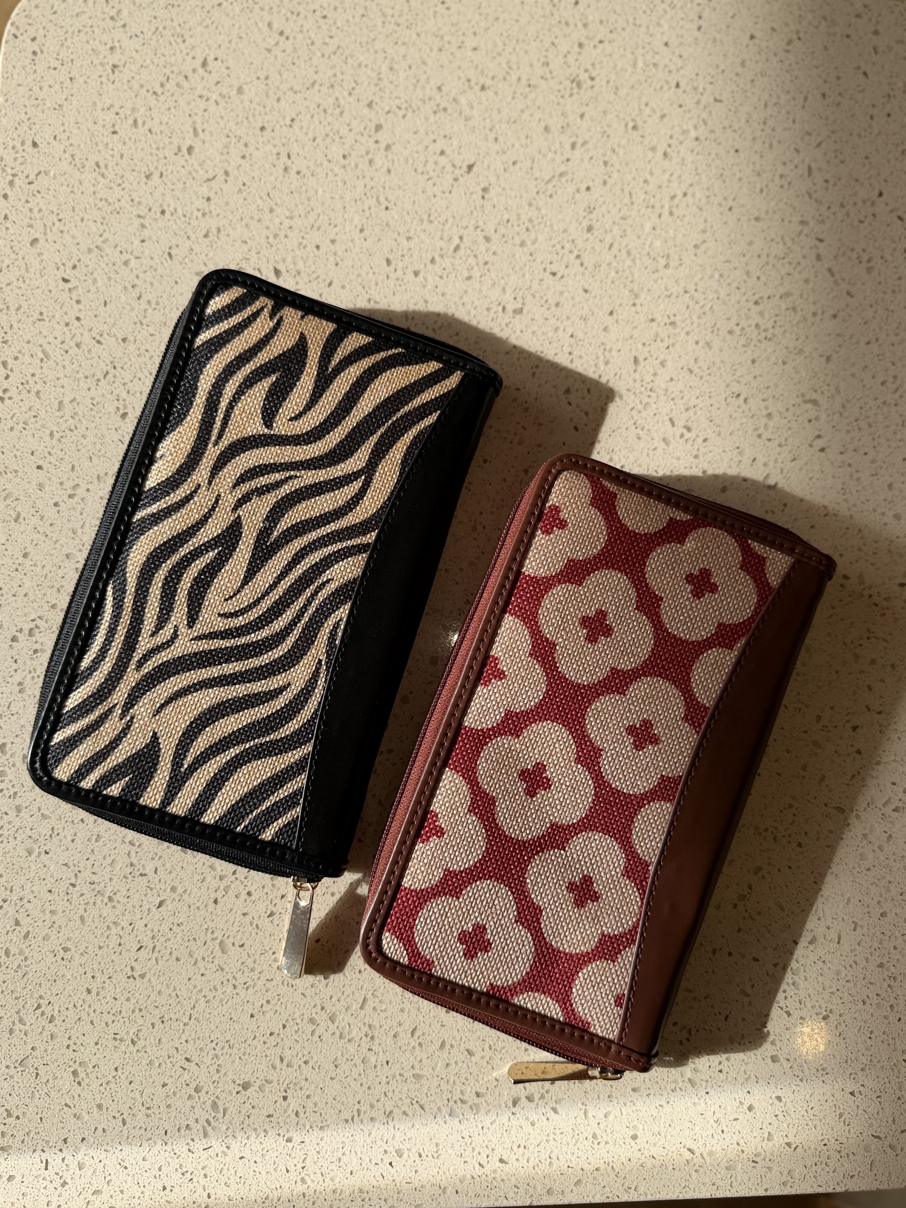Interior view of The Wallet Edit showcasing card slots, snap button, and tan lining accents.