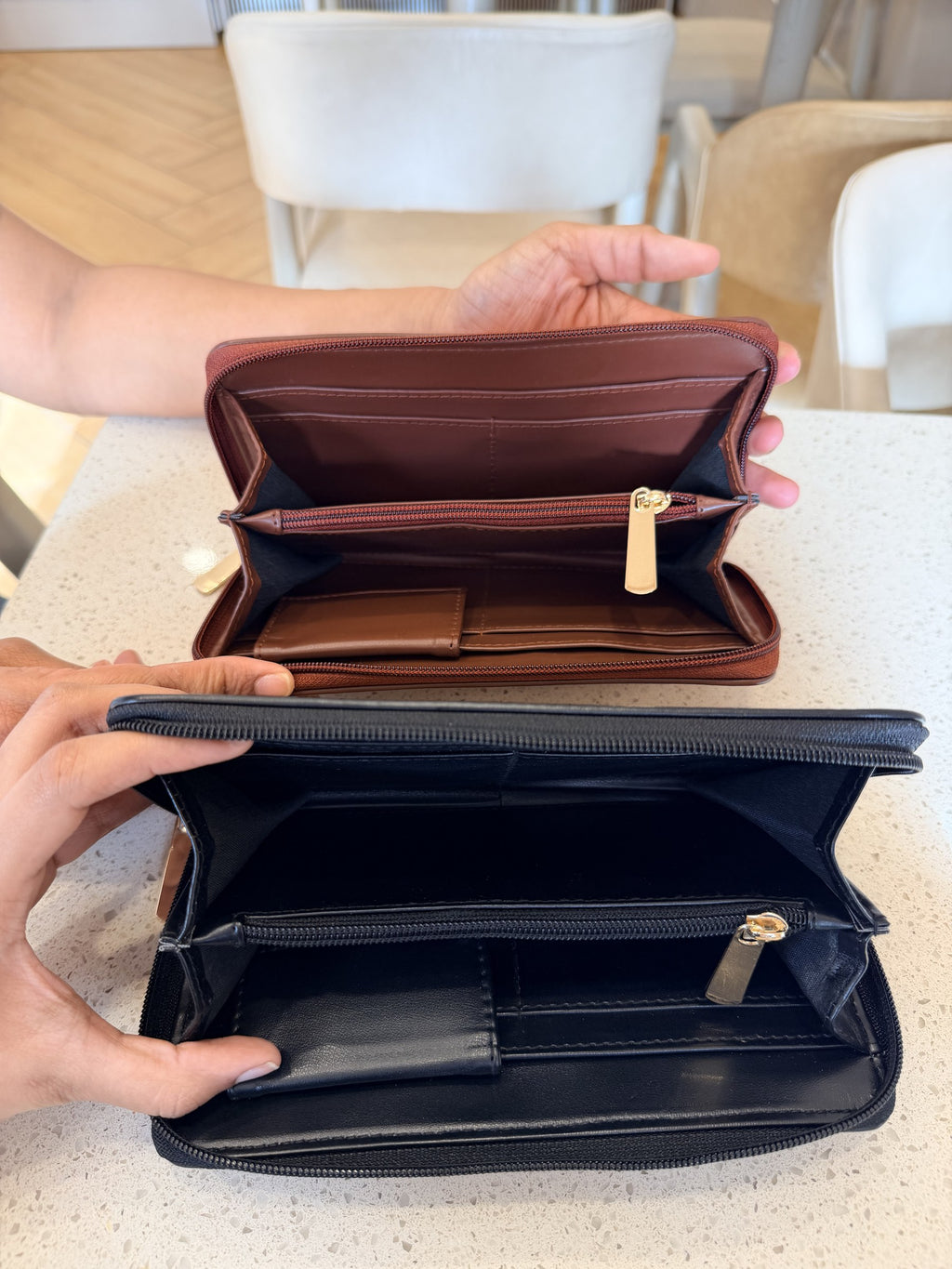 Angle shot showing the premium stitching detail and rich brown leather texture.