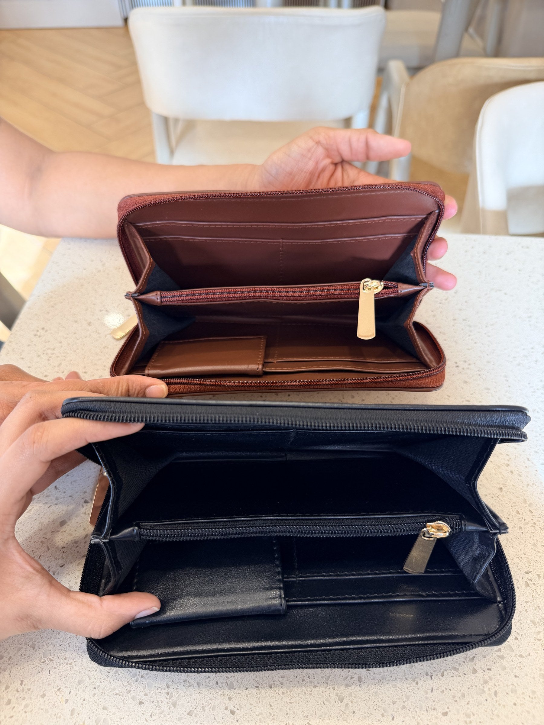 Angle shot showing the premium stitching detail and rich brown leather texture.