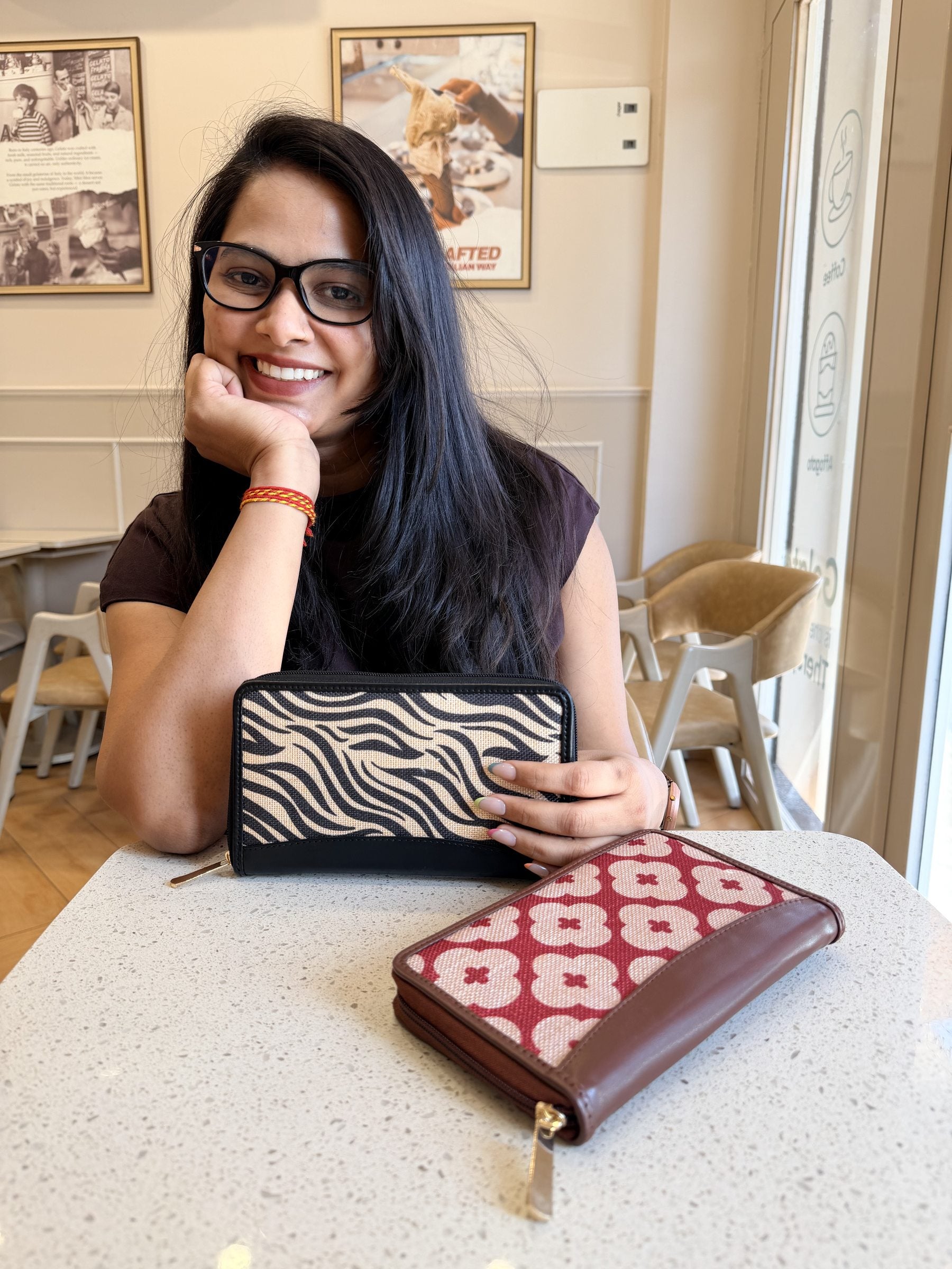 The Wallet Edit displayed alongside a handbag, styled for everyday professional use.