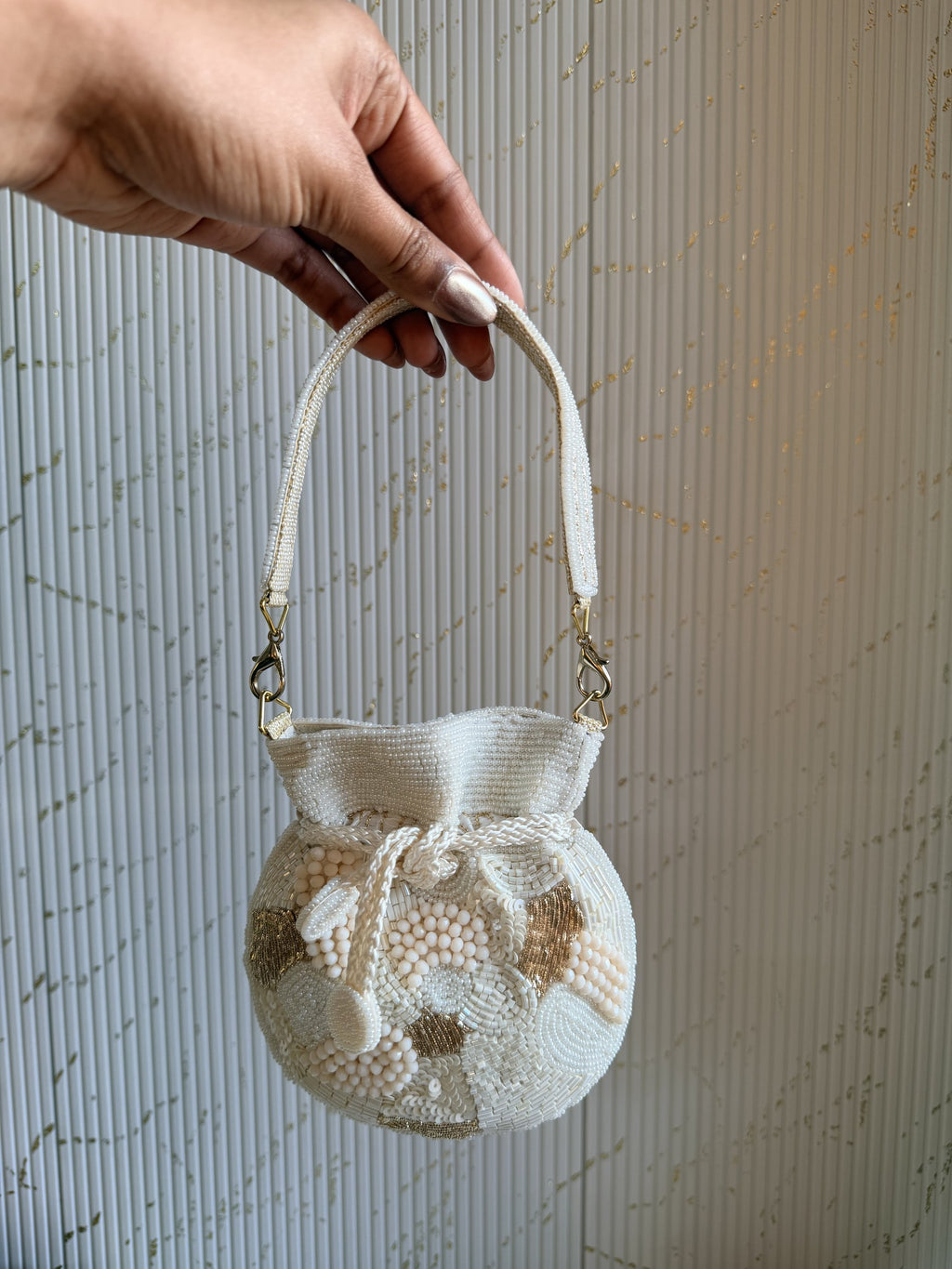 Rear view of the Veloura Mini potli showing the consistent bead patterns on the velvet.