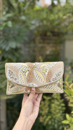 Front view of the Zaraa Blossom flap bag, showcasing its compact rectangular silhouette.