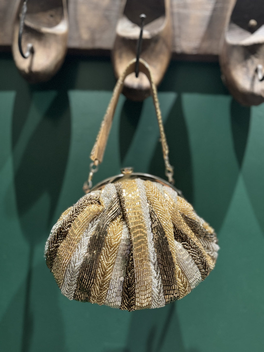 Close-up of the detailed zari threadwork, highlighting the gold and multicolor stitching.