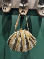 Close-up of the detailed zari threadwork, highlighting the gold and multicolor stitching.